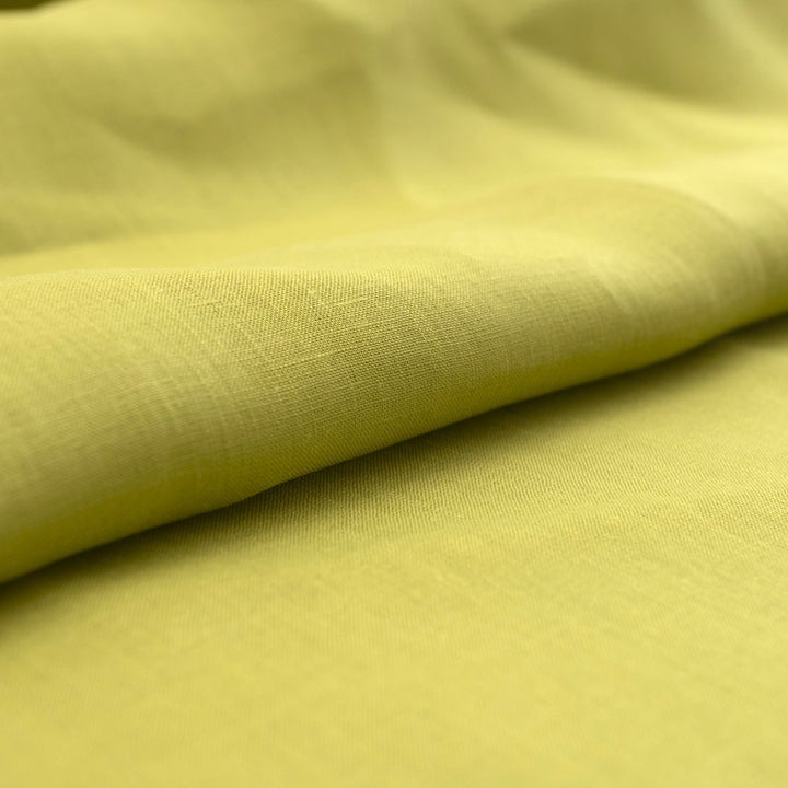 Vibrant apple green linen fabric for sewing summer dresses and tops