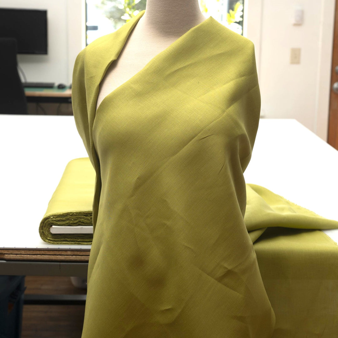 Vibrant apple green linen fabric for sewing summer dresses and tops