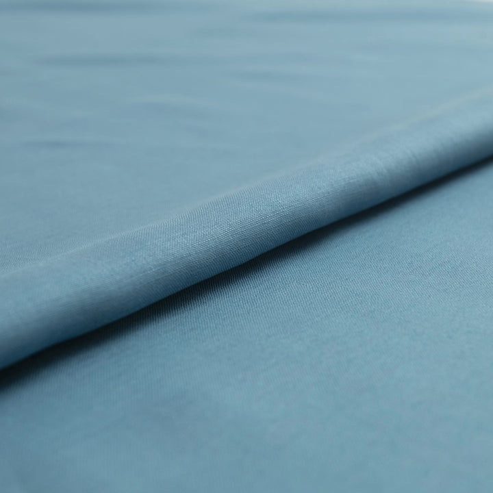 Linen fabric in fresh teal color – 100% lightweight shirt-weight linen, soft yet crisp texture, ideal for shirts, tunics, dresses, and skirts