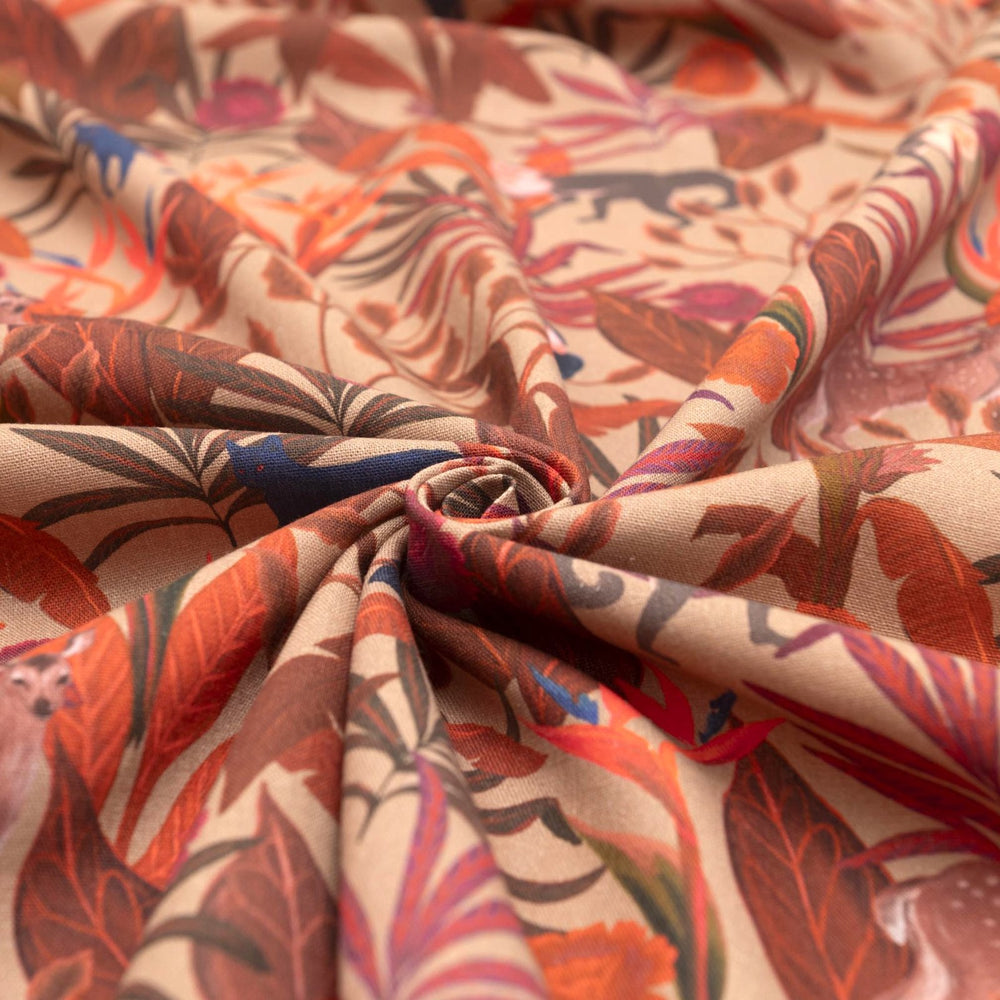 Italian linen fabric in brown with jungle print – features monkeys, birds, and deer on soft yet crisp lightweight linen, ideal for shirts, dresses, and skirts