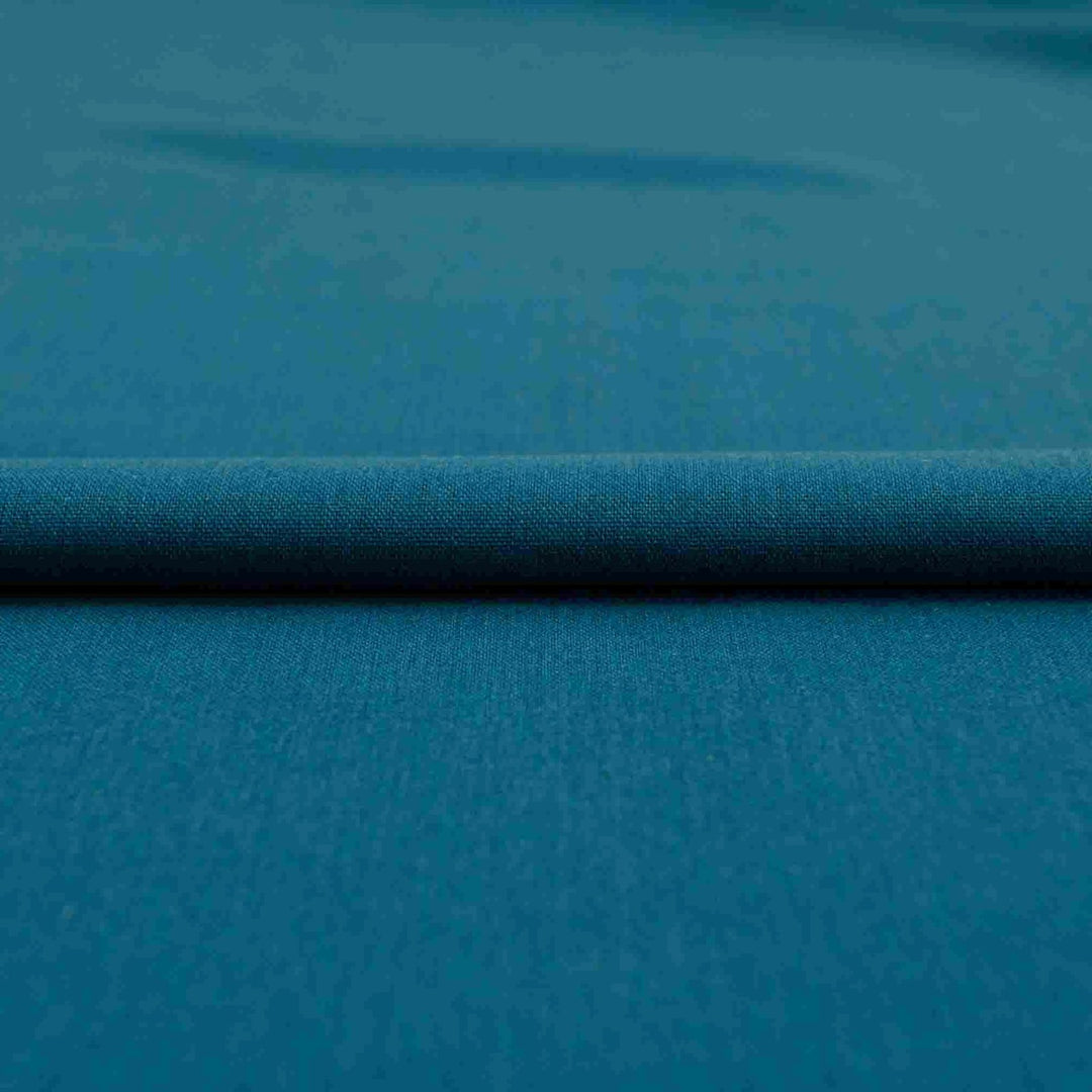 Teal laundered linen fabric, pre-washed for softness and elegant drape

