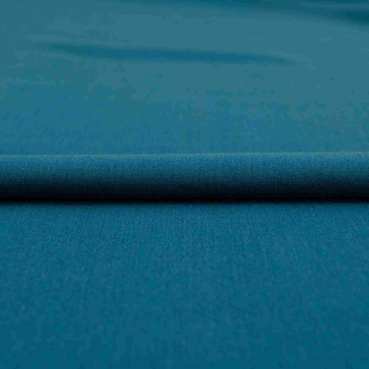 Teal laundered linen fabric, pre-washed for softness and elegant drape

