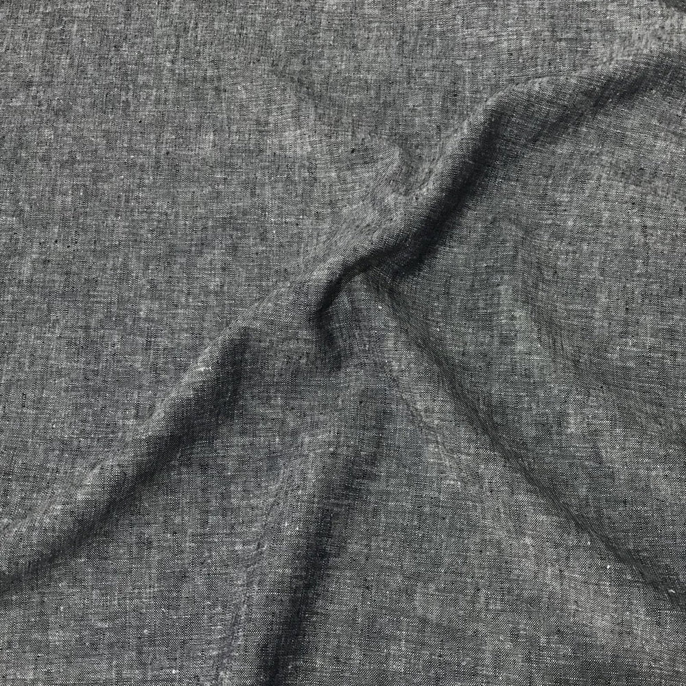 Linen rayon yarn dyed fabric in denim blue with lightweight texture and soft drape, ideal for sewing dresses, tops, and breathable garments.

