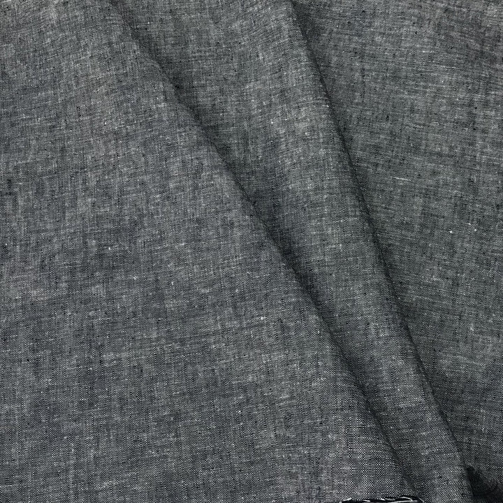 Linen rayon yarn dyed fabric in denim blue with lightweight texture and soft drape, ideal for sewing dresses, tops, and breathable garments.

