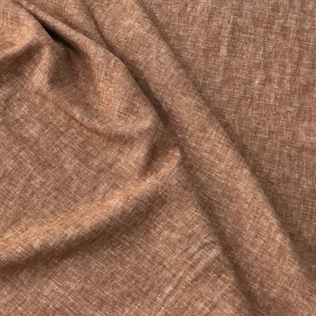 Linen rayon yarn dyed fabric in warm redrock color with soft drape and lightweight texture, perfect for handmade dresses, tops, and skirts.

