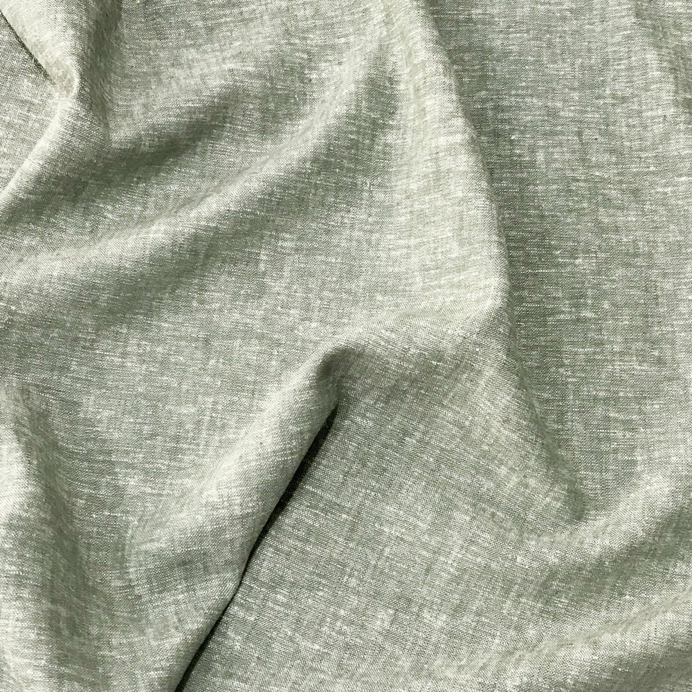 Linen rayon yarn dyed fabric in sage green with lightweight texture and soft drape, ideal for sewing tops, dresses, and layering garments.

