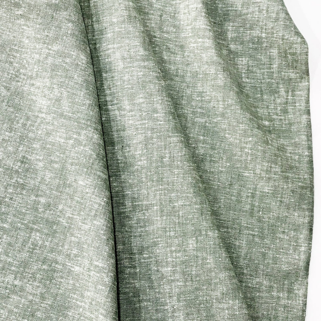 Linen rayon yarn dyed fabric in sage green with lightweight texture and soft drape, ideal for sewing tops, dresses, and layering garments.

