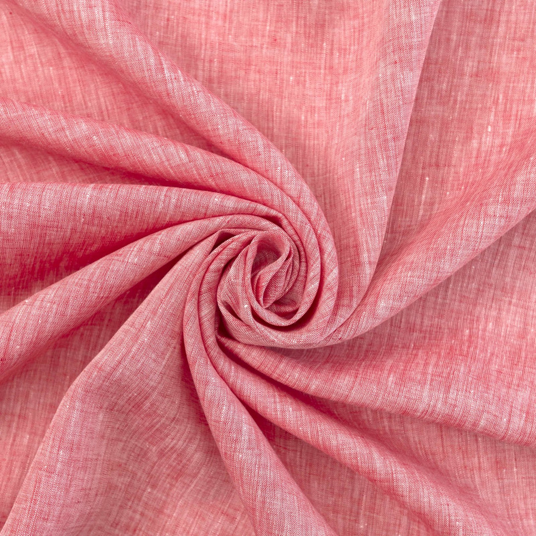 Red linen chambray fabric, lightweight and breathable, with a soft texture ideal for sewing tops, dresses, tunics, and year-round garments.

