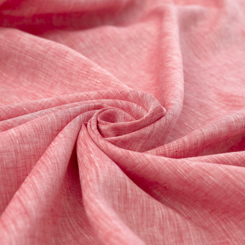 Red linen chambray fabric, lightweight and breathable, with a soft texture ideal for sewing tops, dresses, tunics, and year-round garments.

