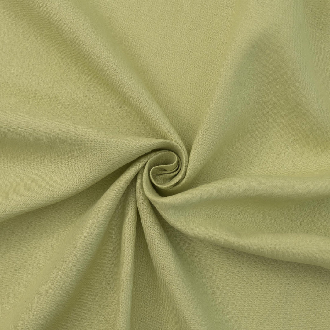 Lightweight linen fabric in soft celadon for sewing projects