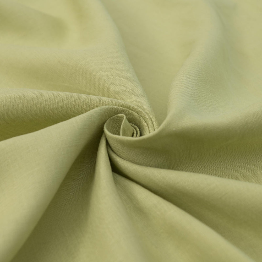 Lightweight linen fabric in soft celadon for sewing projects