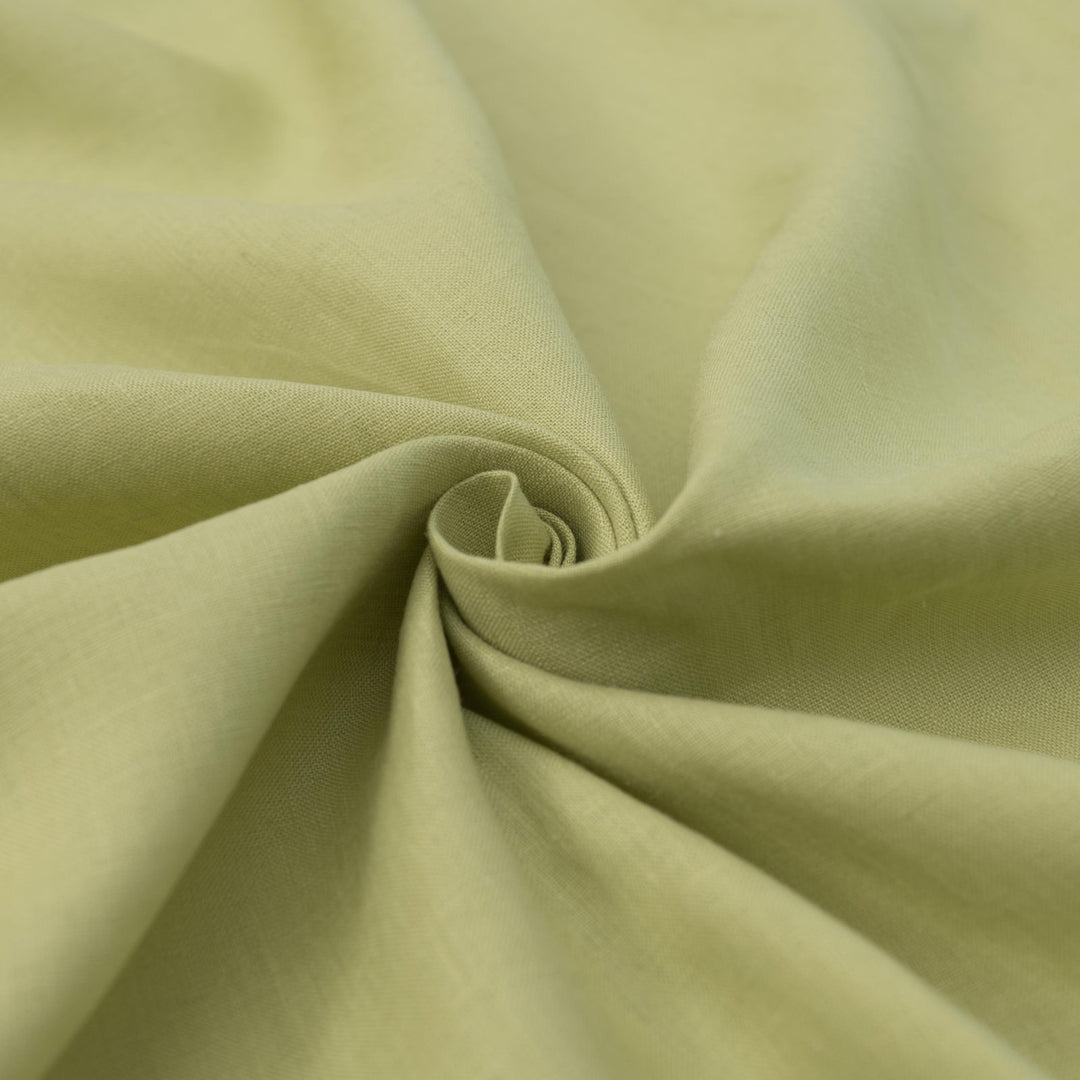 Lightweight linen fabric in soft celadon for sewing projects