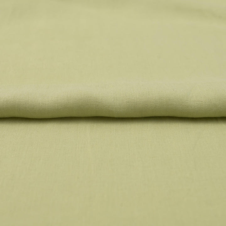 Lightweight linen fabric in soft celadon for sewing projects