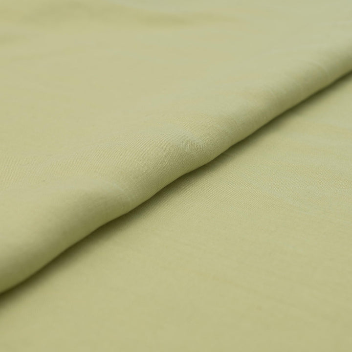 Lightweight linen fabric in soft celadon for sewing projects