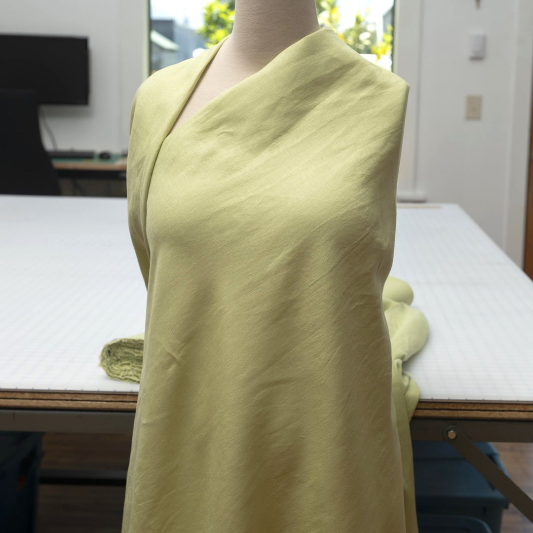 Lightweight linen fabric in soft celadon for sewing projects