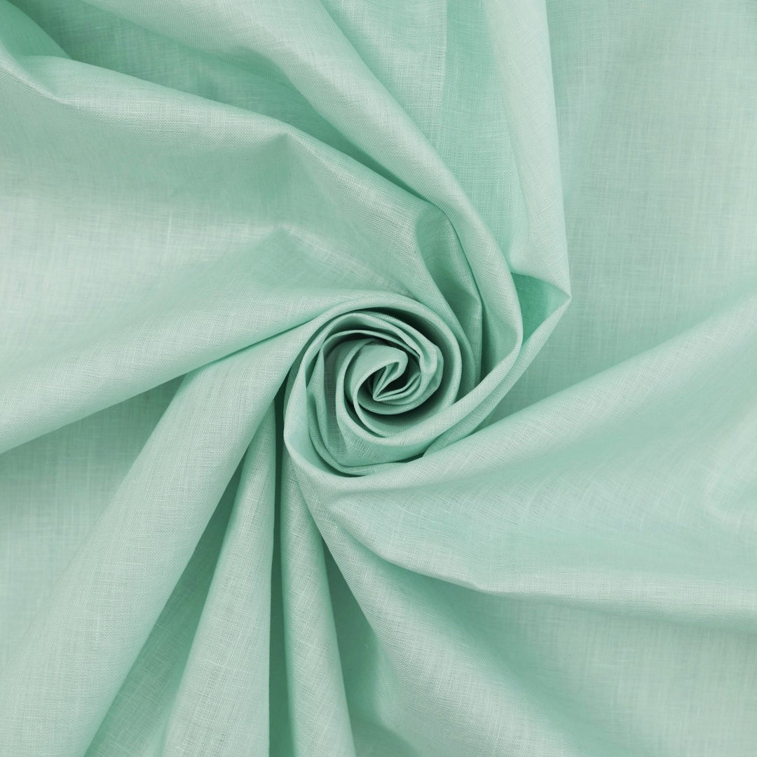 Soft mint linen fabric for sewing flowy dresses and summer outfits
