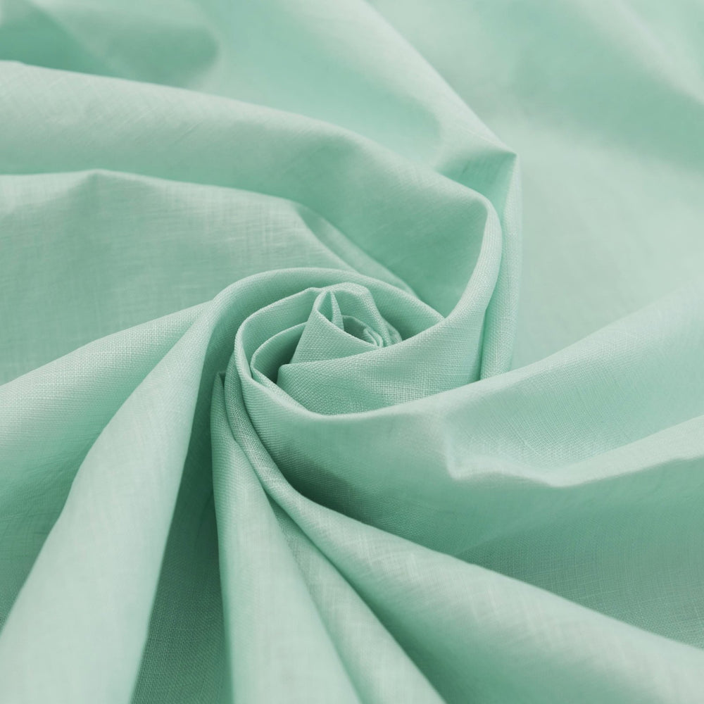 Soft mint linen fabric for sewing flowy dresses and summer outfits