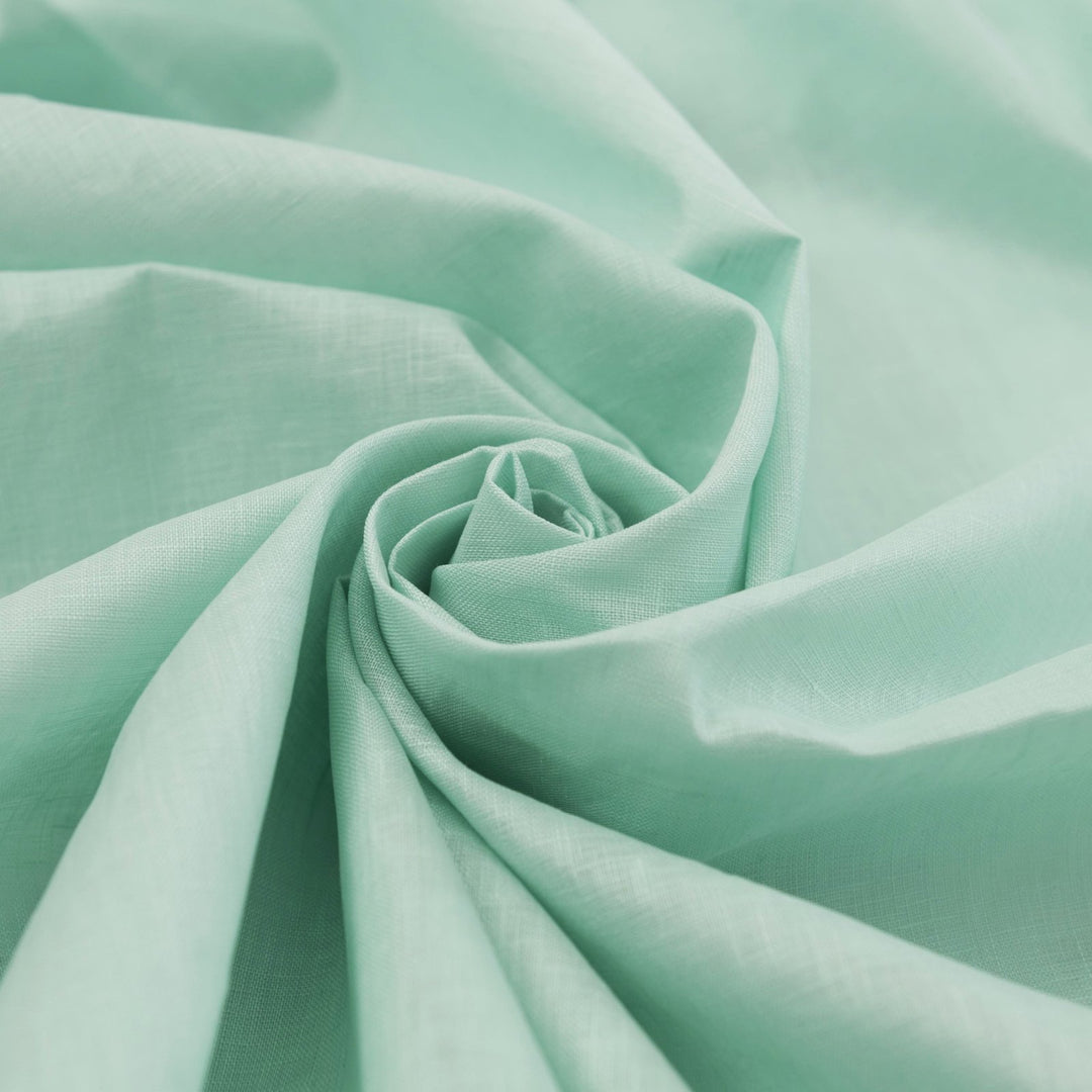 Soft mint linen fabric for sewing flowy dresses and summer outfits