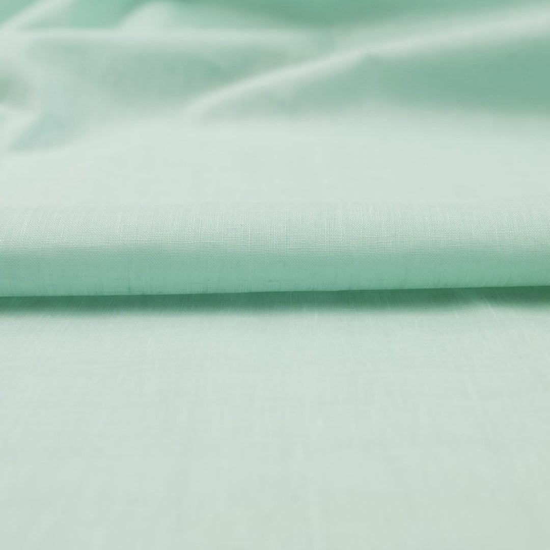 Soft mint linen fabric for sewing flowy dresses and summer outfits