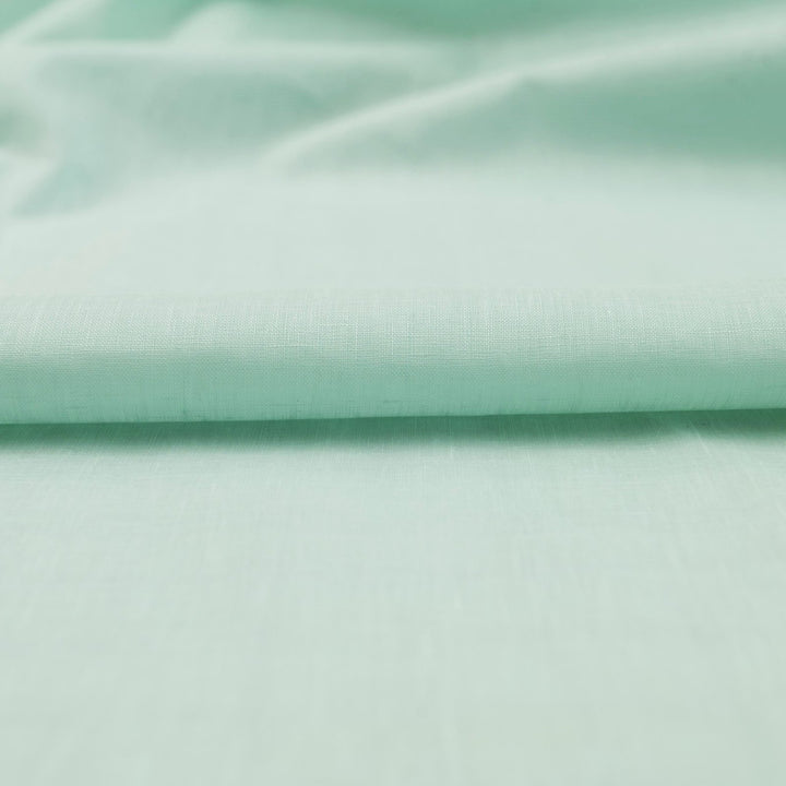 Soft mint linen fabric for sewing flowy dresses and summer outfits