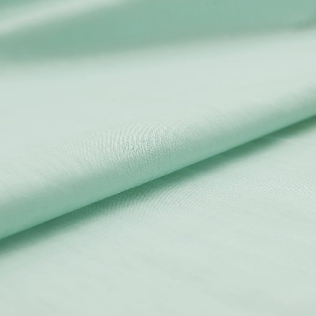 Soft mint linen fabric for sewing flowy dresses and summer outfits