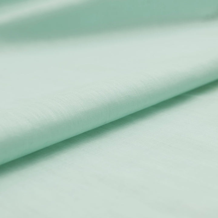 Soft mint linen fabric for sewing flowy dresses and summer outfits