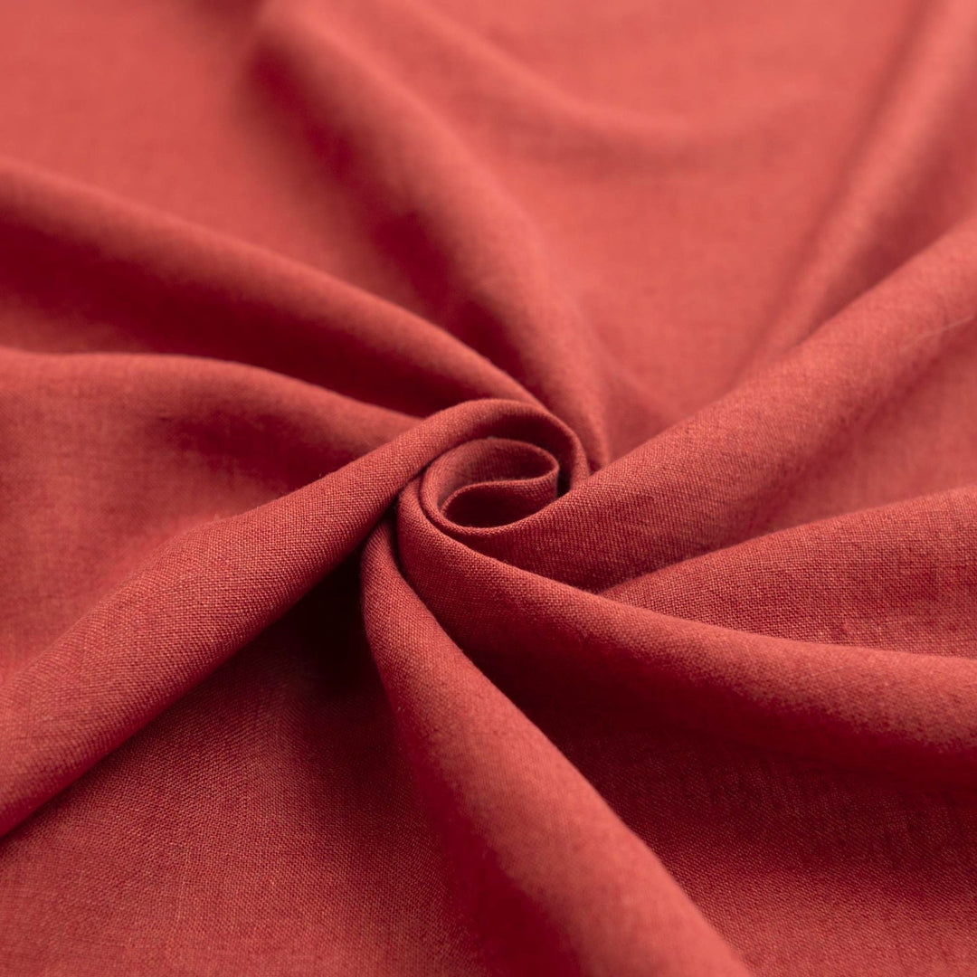 Linen fabric in warm rust color – 100% lightweight linen, shirt-weight with soft drape, ideal for shirts, tops, and casual dresses