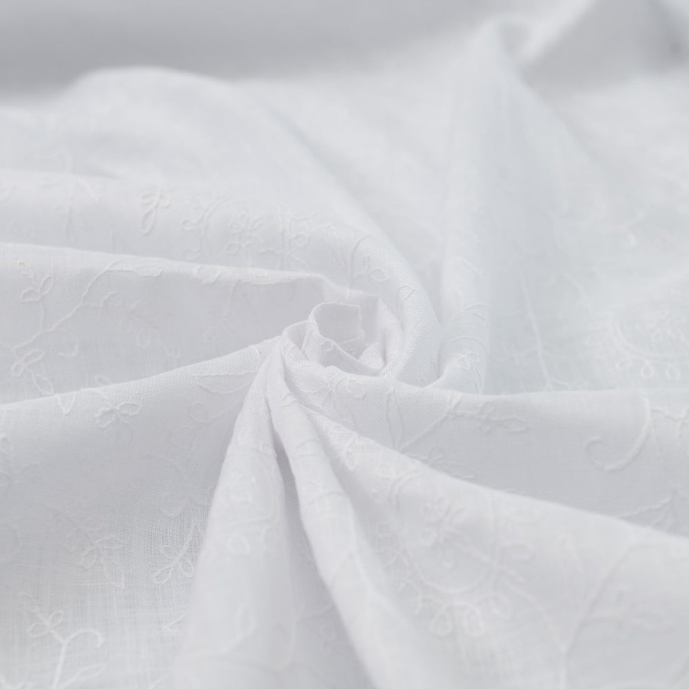 Delicate embroidered linen for minimalist sewing projects