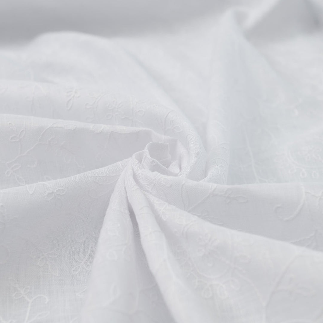 Delicate embroidered linen for minimalist sewing projects