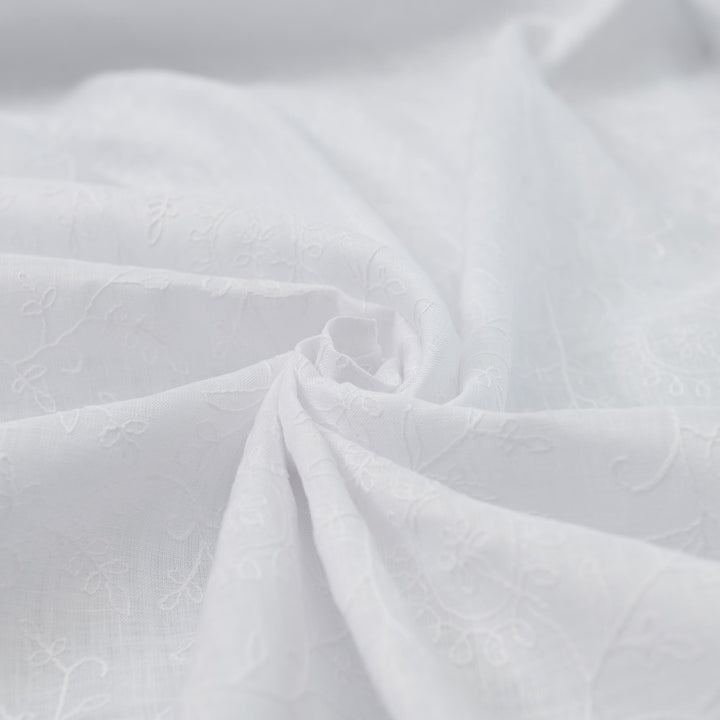 Delicate embroidered linen for minimalist sewing projects
