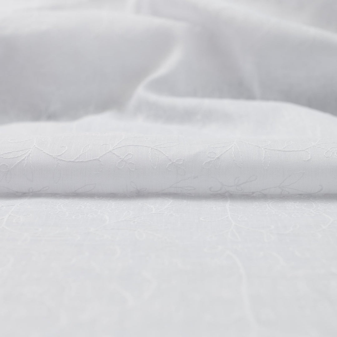 Delicate embroidered linen for minimalist sewing projects