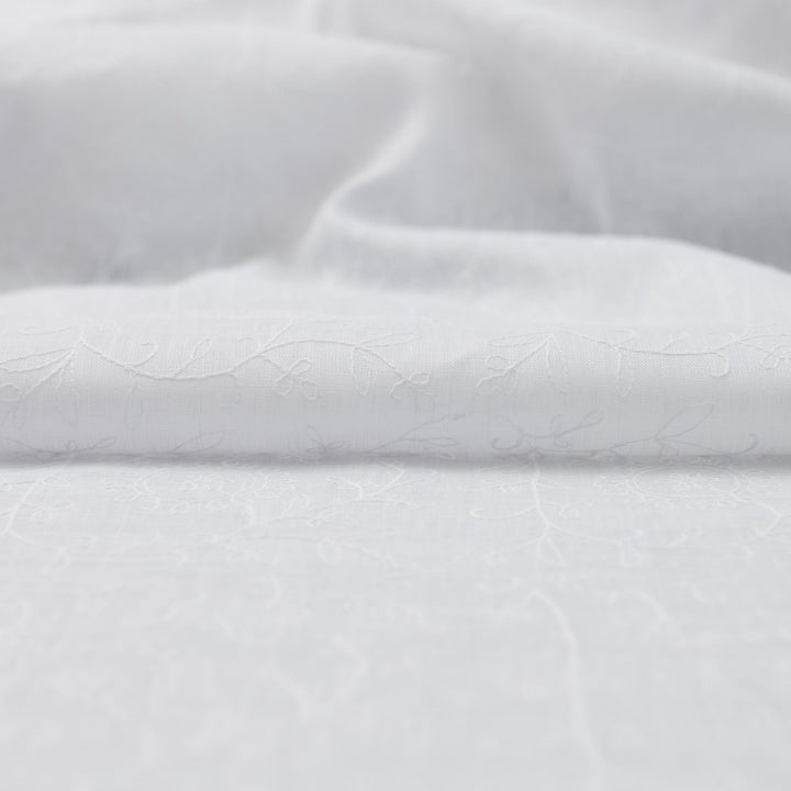 Delicate embroidered linen for minimalist sewing projects