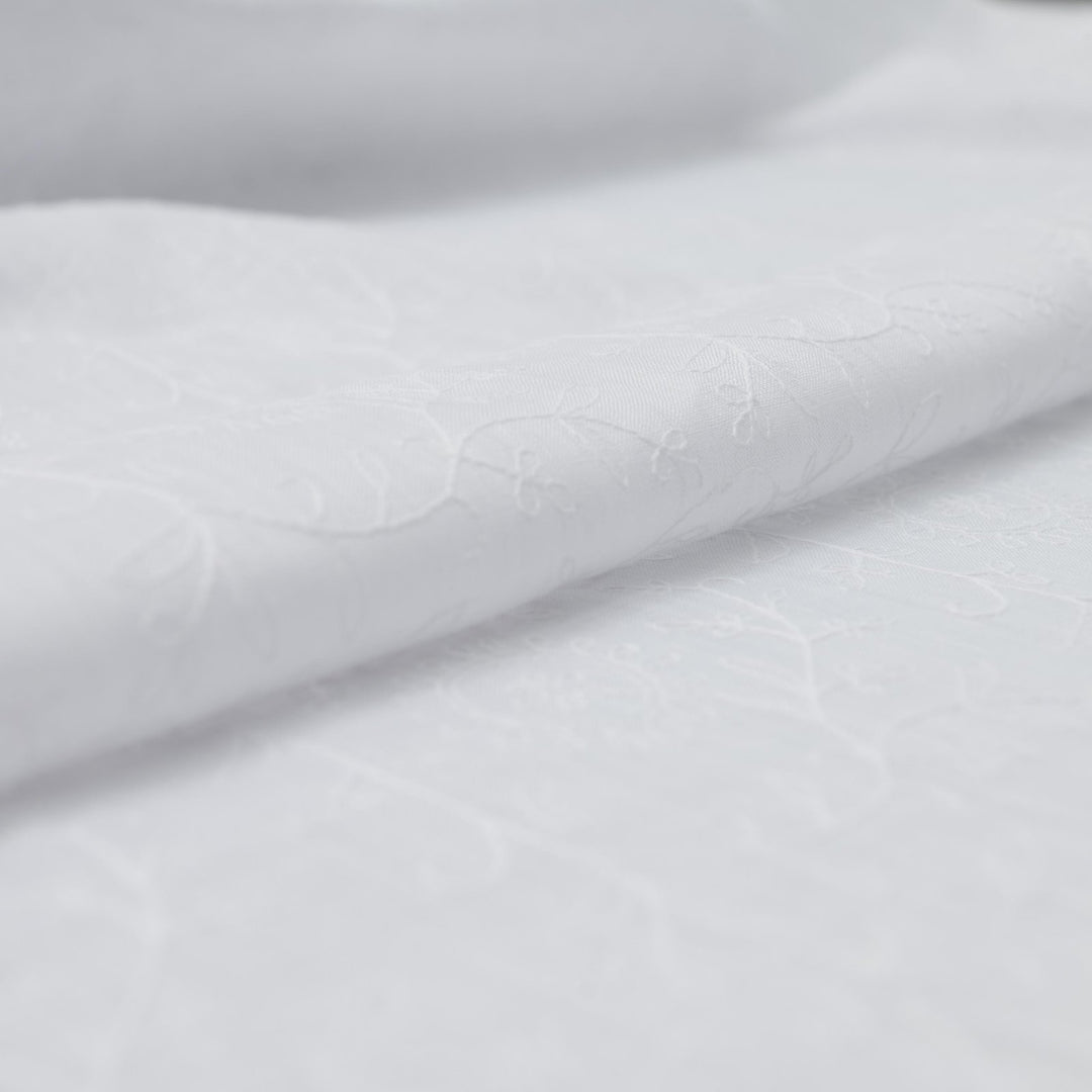 Delicate embroidered linen for minimalist sewing projects