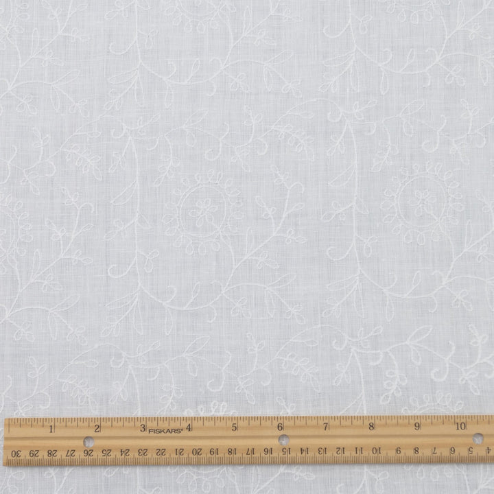 Delicate embroidered linen for minimalist sewing projects