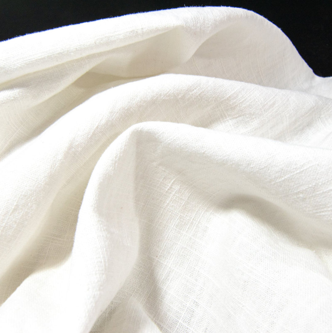 "Linen Cotton Blend Arctic White – Mid-weight opaque fabric, 55% linen and 45% cotton, ideal for blazers, pants, and dresses"

