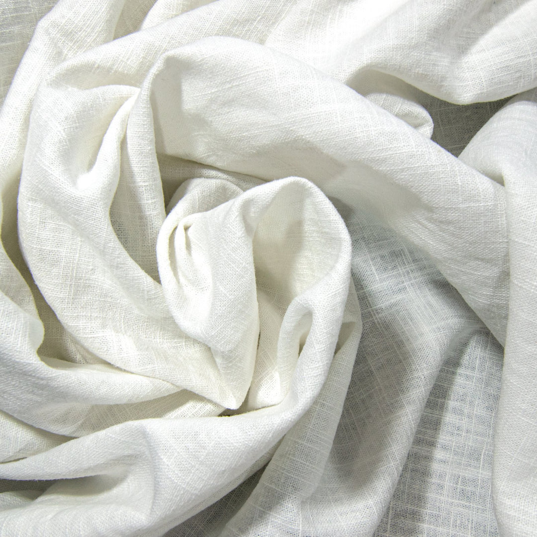 "Linen Cotton Blend Arctic White – Mid-weight opaque fabric, 55% linen and 45% cotton, ideal for blazers, pants, and dresses"

