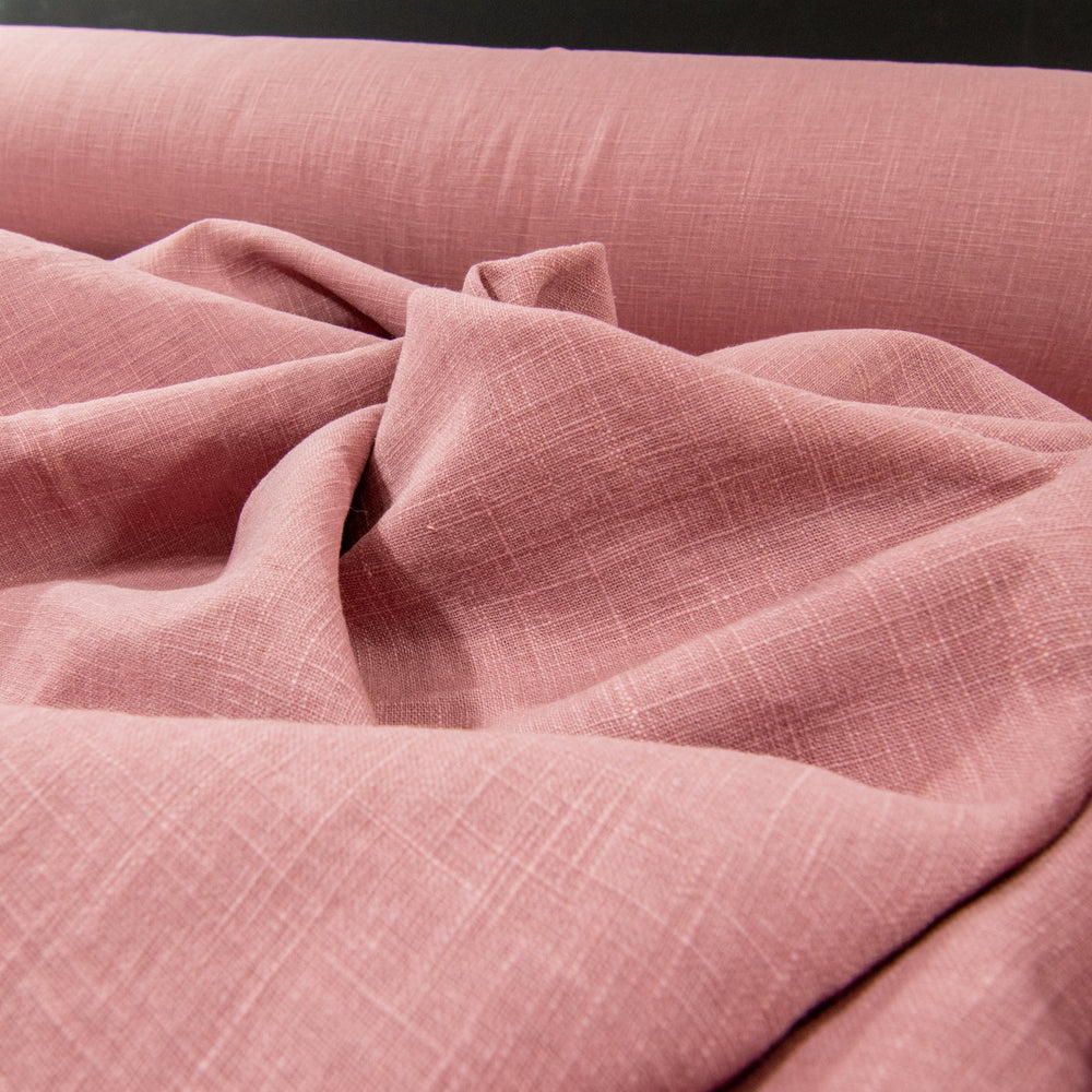 Soft Linen Cotton Blend fabric in Dusty Pink, showcasing a gentle texture and subtle woven pattern, perfect for creating stylish garments