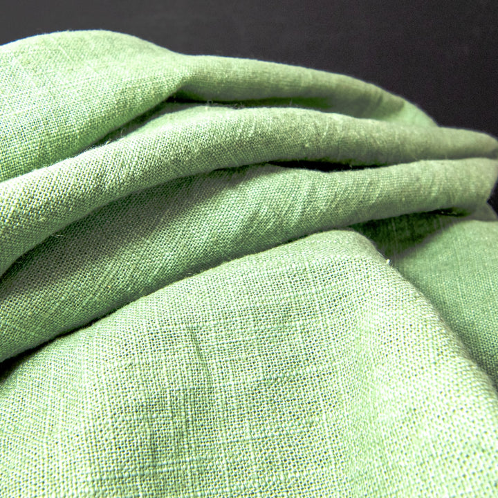 Soft Linen Cotton Blend fabric in Spring Green, featuring a smooth texture and natural, breathable feel, ideal for creating stylish, comfortable garments.
