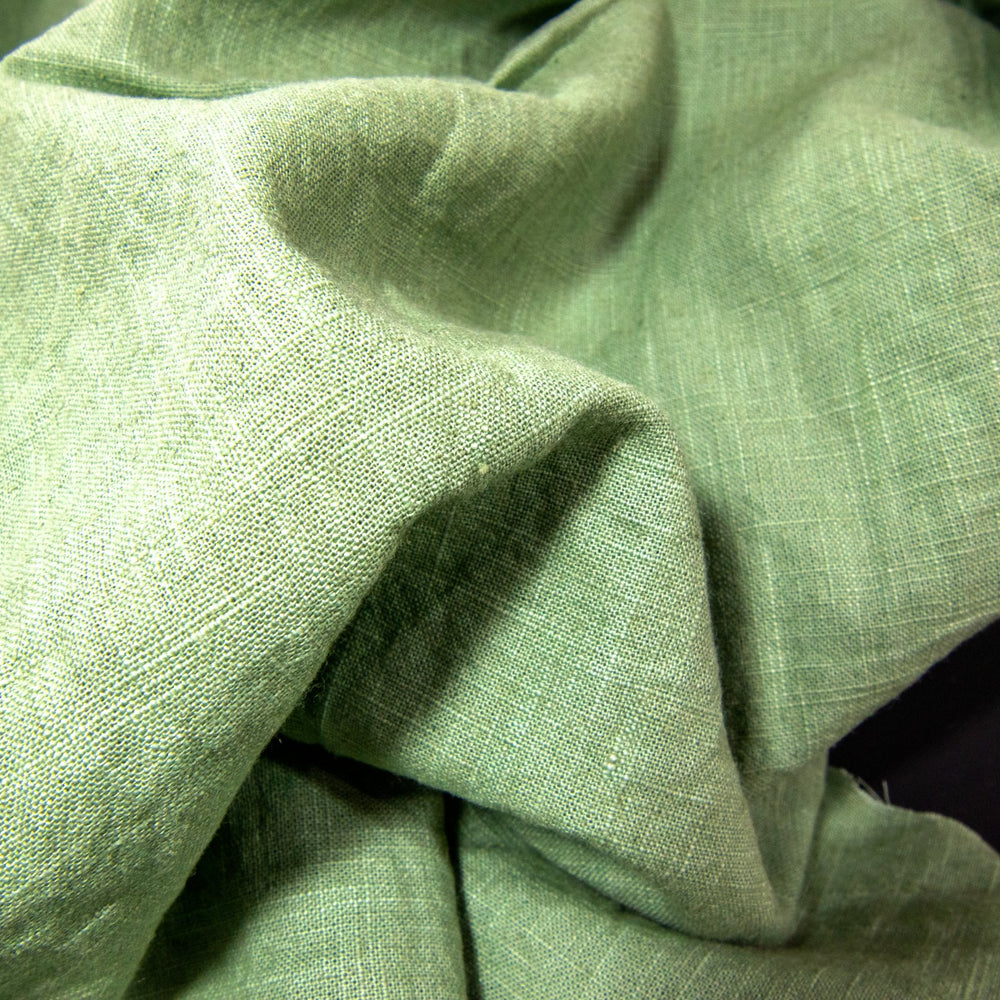 Soft Linen Cotton Blend fabric in Spring Green, featuring a smooth texture and natural, breathable feel, ideal for creating stylish, comfortable garments.