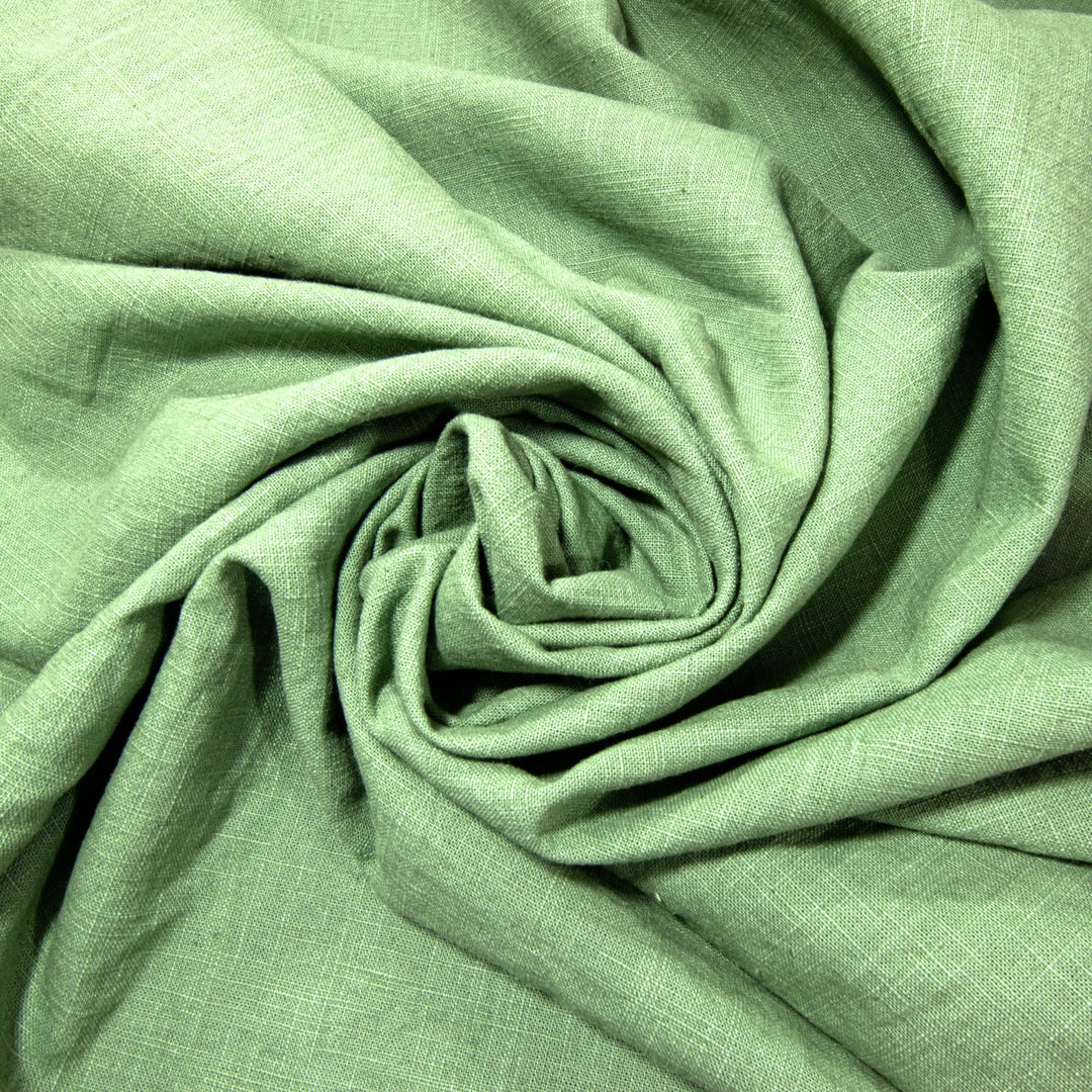Soft Linen Cotton Blend fabric in Spring Green, featuring a smooth texture and natural, breathable feel, ideal for creating stylish, comfortable garments.