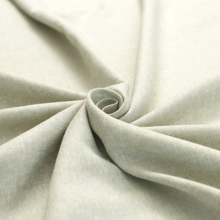 Close-up of Linen/Rayon Yarn Dye fabric in moss green showing yarn-dyed texture and color variation.