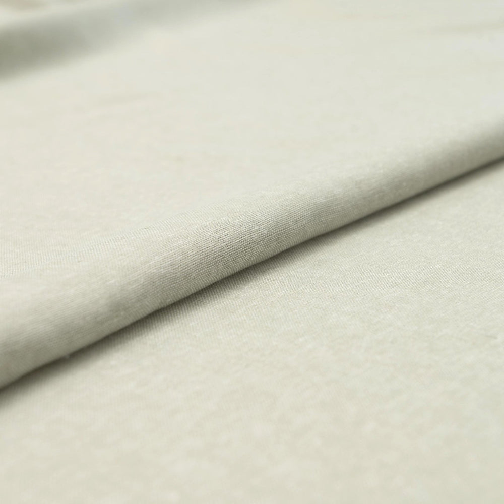 Close-up of Linen/Rayon Yarn Dye fabric in moss green showing yarn-dyed texture and color variation.