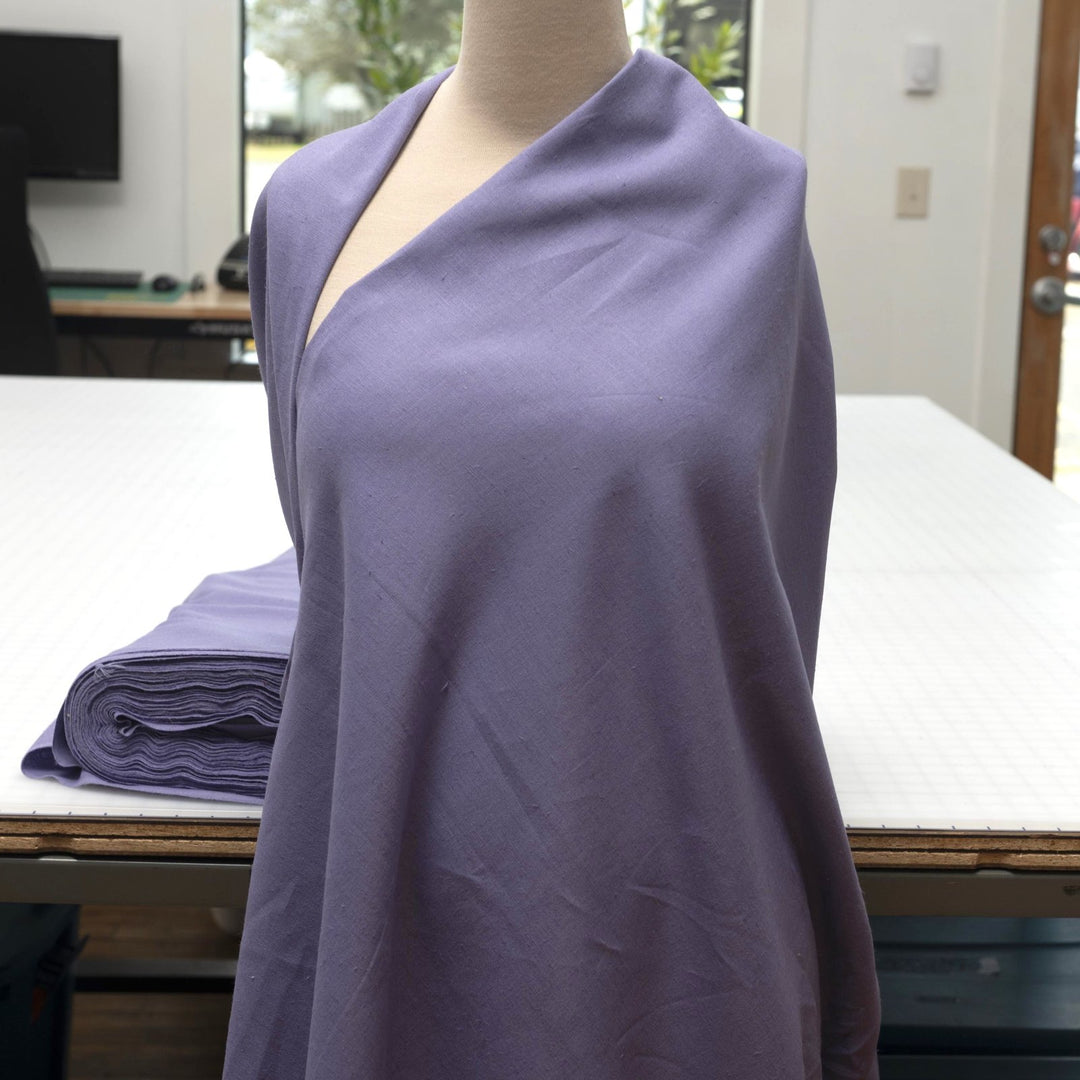 Lavender linen and cotton blend fabric, mid-weight, breathable, and opaque, with a soft drape ideal for sewing dresses, tunics, pants, and shirts.

