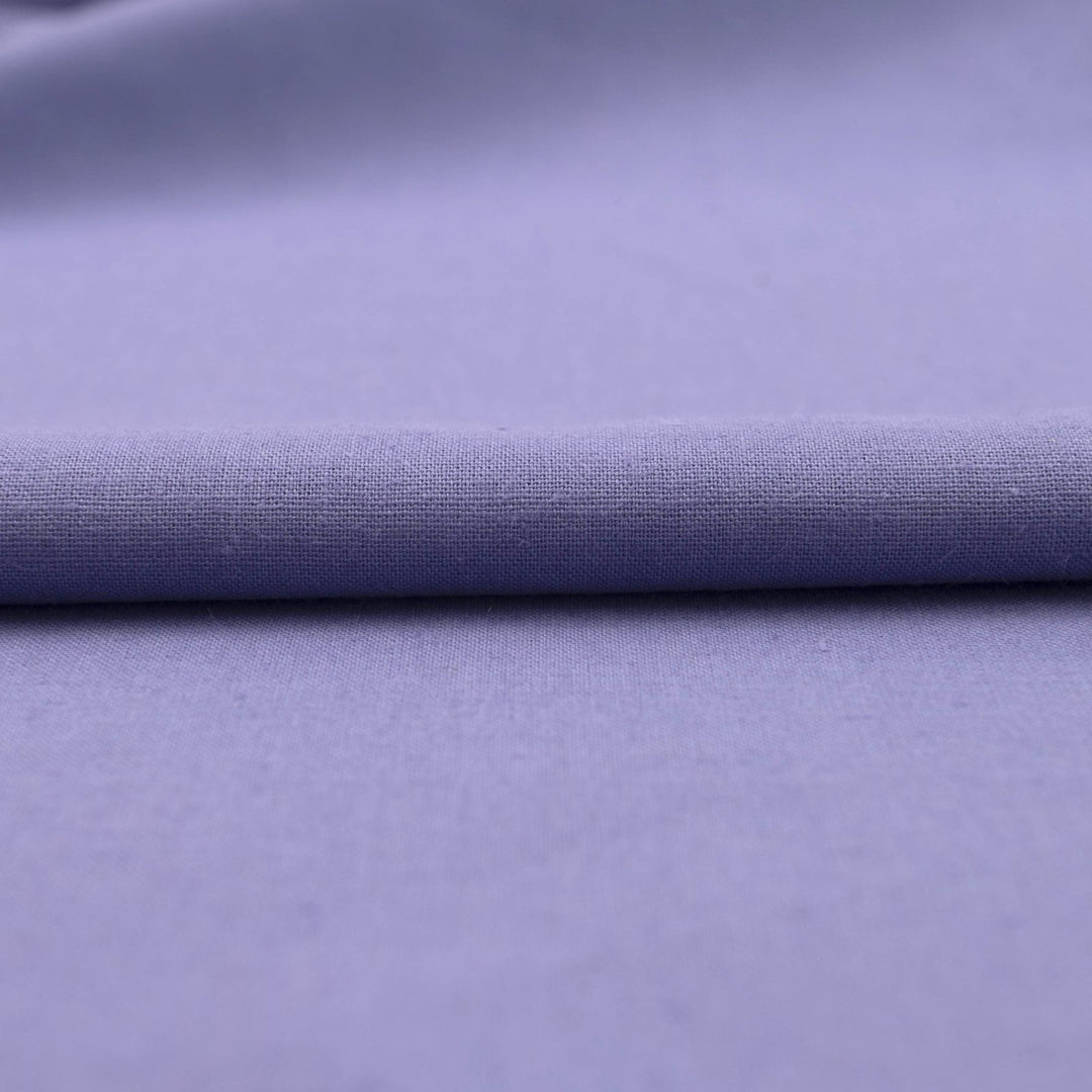 Lavender linen and cotton blend fabric, mid-weight, breathable, and opaque, with a soft drape ideal for sewing dresses, tunics, pants, and shirts.


