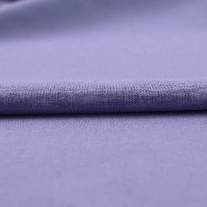 Lavender linen and cotton blend fabric, mid-weight, breathable, and opaque, with a soft drape ideal for sewing dresses, tunics, pants, and shirts.

