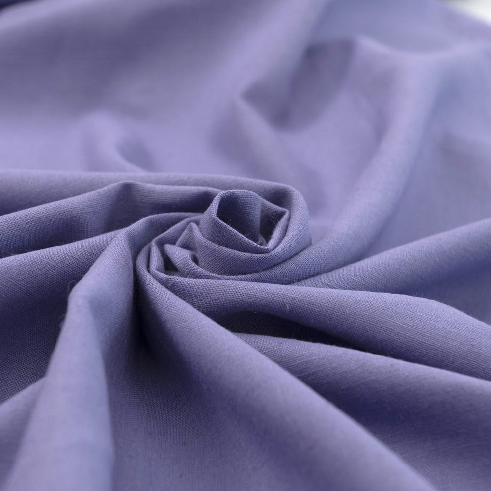 Lavender linen and cotton blend fabric, mid-weight, breathable, and opaque, with a soft drape ideal for sewing dresses, tunics, pants, and shirts.

