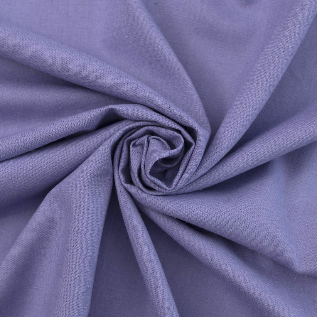 Lavender linen and cotton blend fabric, mid-weight, breathable, and opaque, with a soft drape ideal for sewing dresses, tunics, pants, and shirts.

