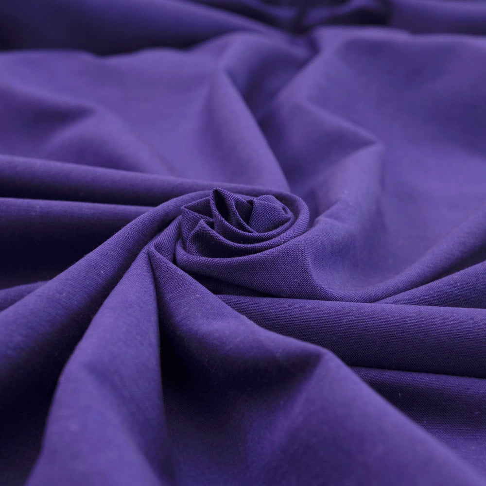 Royal purple linen and cotton blend fabric, mid-weight, soft, breathable, and opaque, ideal for sewing dresses, tunics, pants, shirts, and light jackets.

