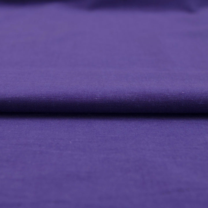Royal purple linen and cotton blend fabric, mid-weight, soft, breathable, and opaque, ideal for sewing dresses, tunics, pants, shirts, and light jackets.

