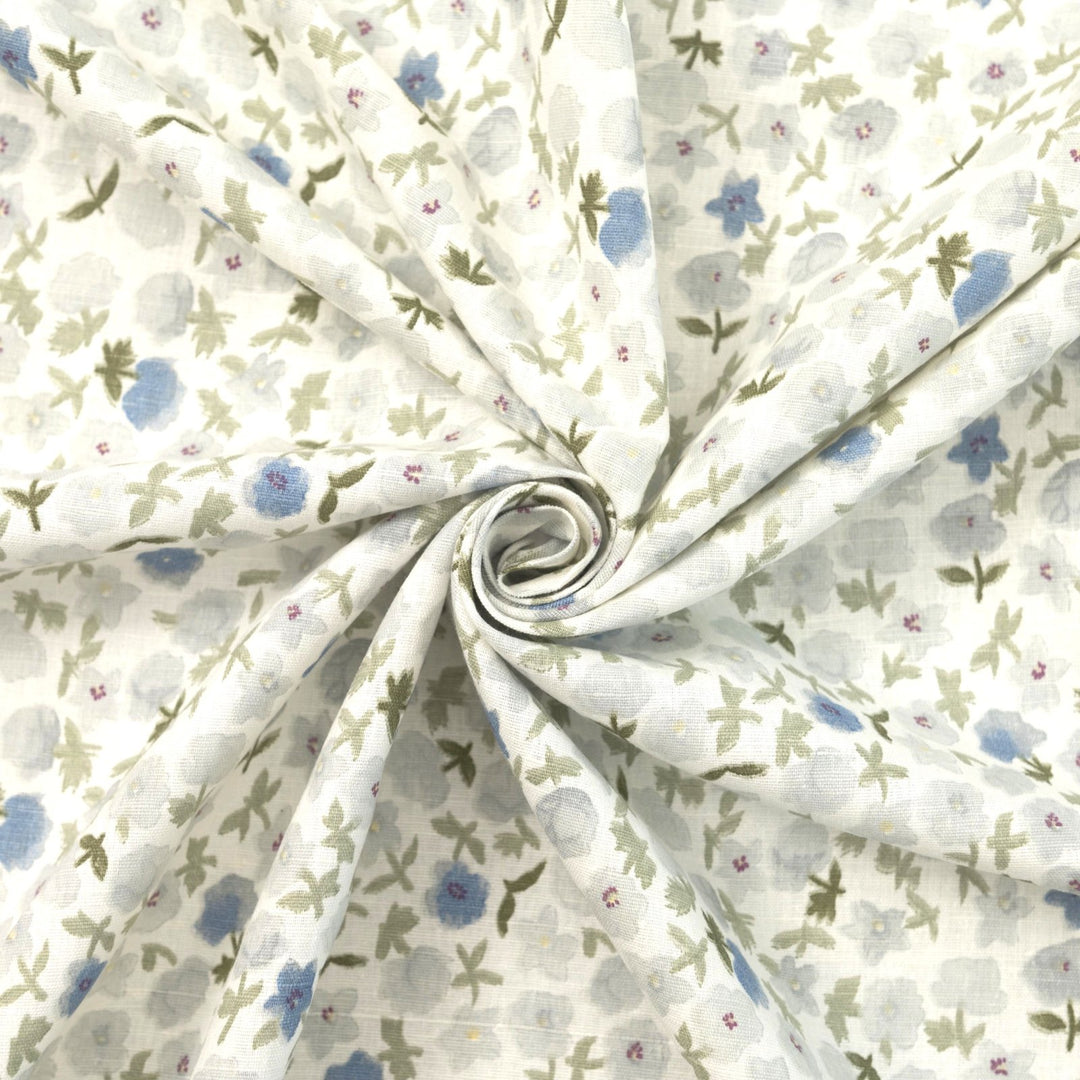 Linen and cotton blend fabric with soft blue floral pattern and green stems, 56-inch wide lightweight fabric